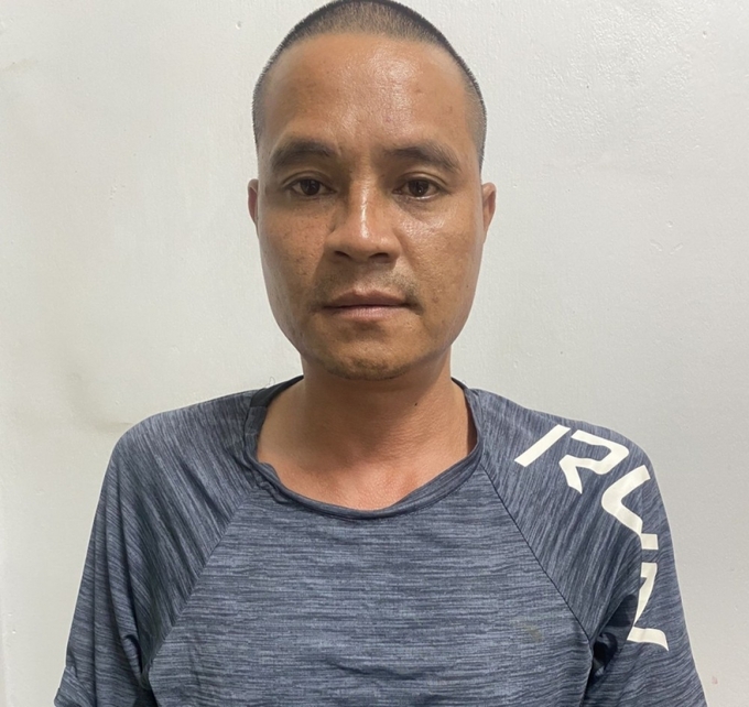 Trần Quang Thìn tại cơ quan công an.