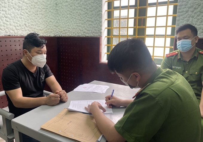 Hoàng Quang Chương tại cơ quan công an. Ảnh: Công an tỉnh Lào Cai