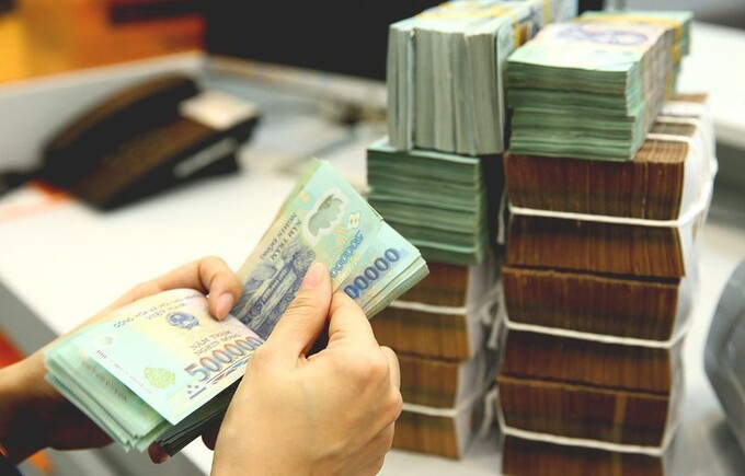 Tỷ giá USD/VND tăng 0,8% so với tháng trước trên thị trường tự do