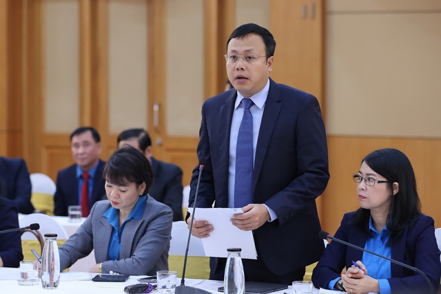 Đại diện Liên đoàn Lao động TP. Hà Nội báo cáo tại Hội nghị