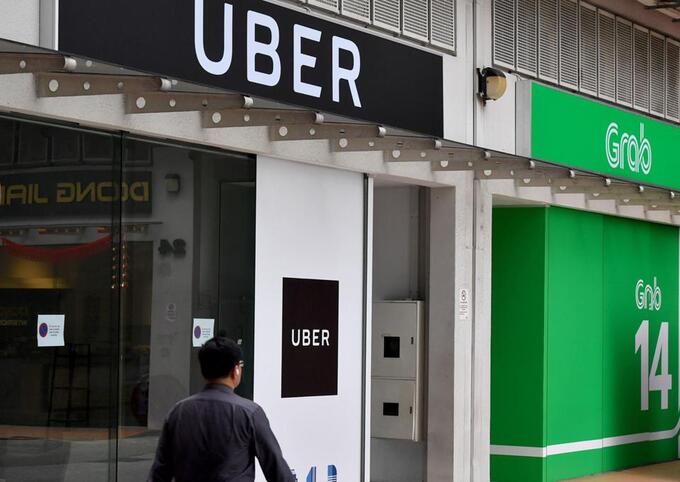 Uber và Grab được coi như là một cảnh báo đầu tiên trong dòng chảy cách mạng công nghiệp 4.0.