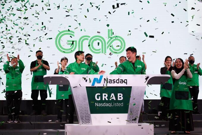Bà Tan Hooi Ling và ông Anthony Tan trong buổi lễ 'rung chuông', chính thức IPO trên sàn chứng khoán của Mỹ