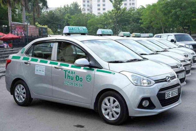 Tài xế các hãng taxi công nghệ đều nâng cao chất lượng phục vụ khách hàng