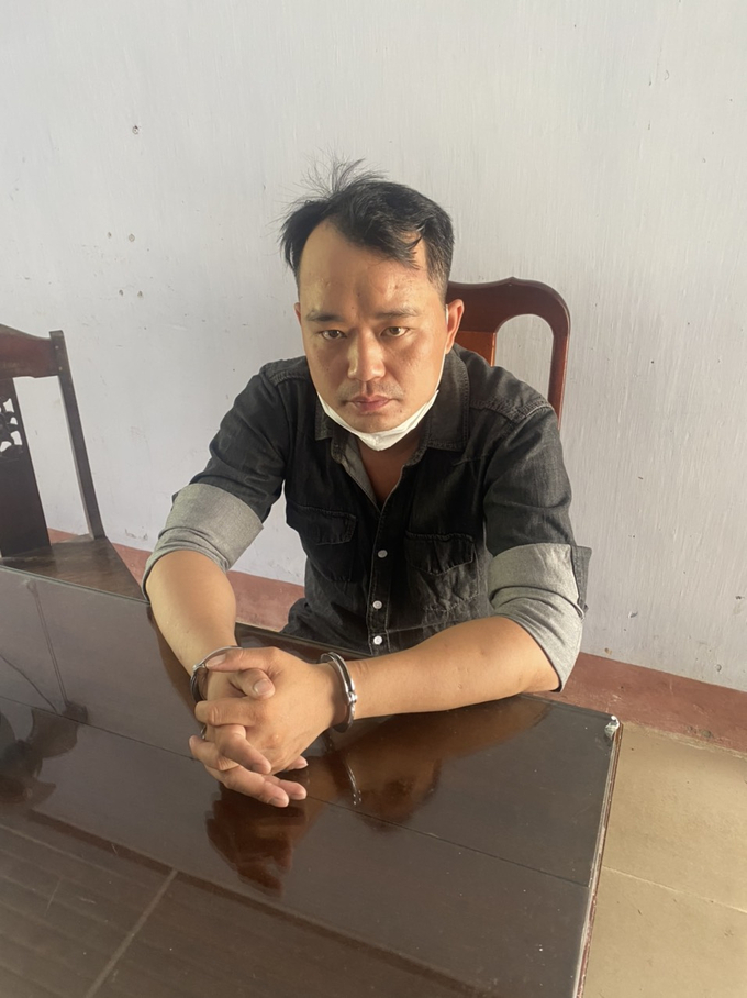 Đối tượng Trần Bá Nhã bị bắt giữ tại cơ quan công an