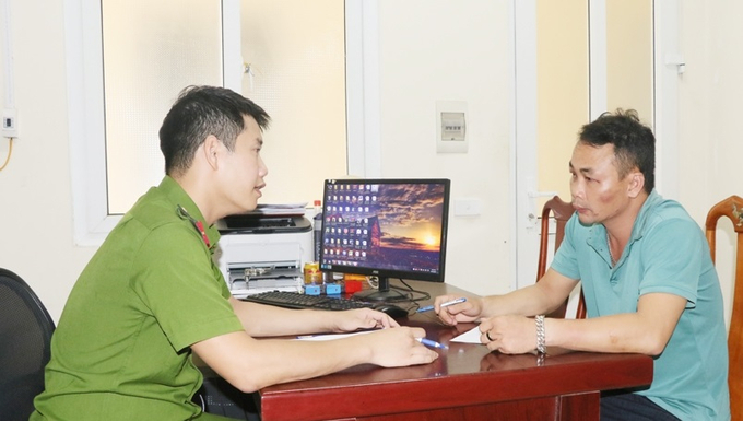 Trần Đình Nhất tại cơ quan công an